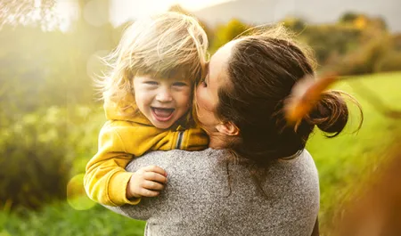 mother holding her child